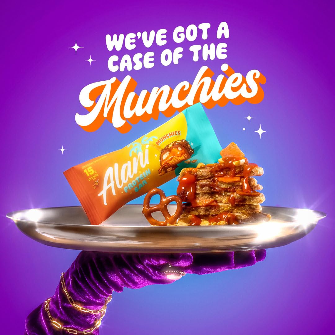 AlaniNu Protein Bar Munchies — wrapped bar and caramel-drizzled stack on a silver tray held by a gloved hand